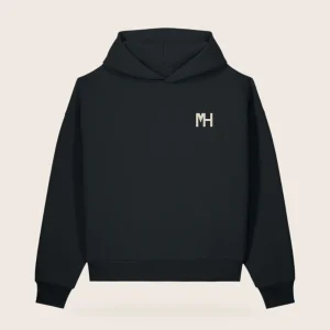 MH Essential Hoodie, black, front view, with a small cream MH monogram at the left chest