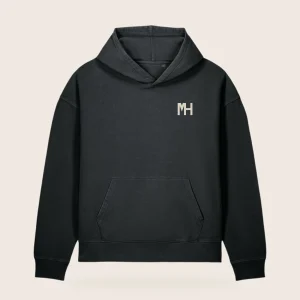 MH Washed Hoodie, washed black, front view, with a small cream MH monogram at the left chest